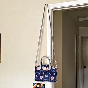 New York Yankee's Dooney and Bourke crossbody purse
